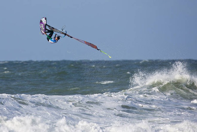 Rail grab back loop from Traversa - 2012 PWA Cold Hawaii World Cup ©  John Carter / PWA http://www.pwaworldtour.com